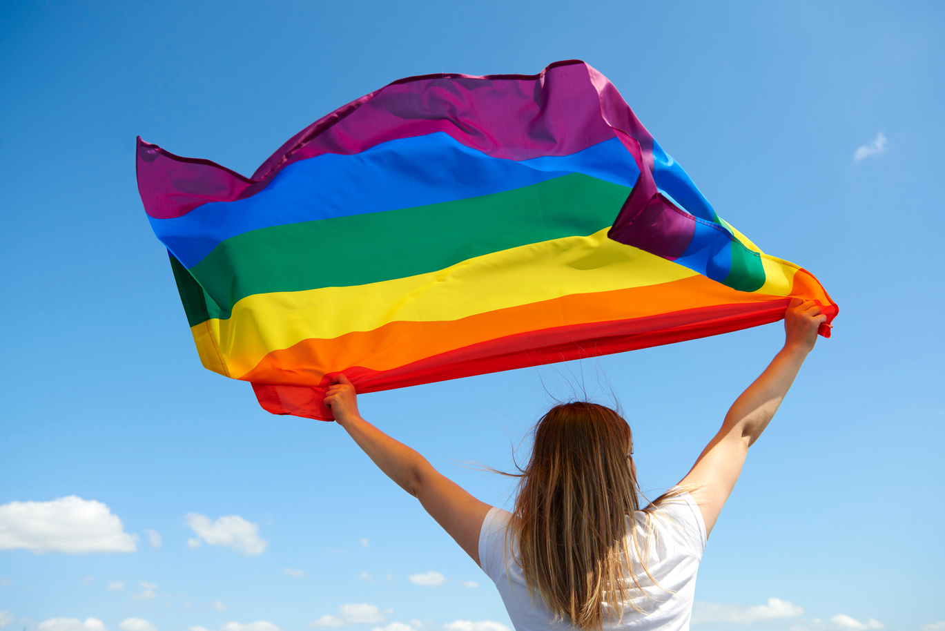 Woman Waving LGBT Flag